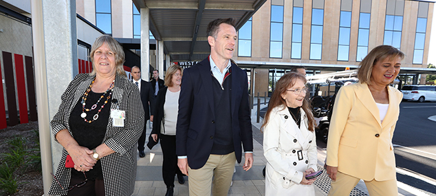 NNSWLHD Director Clinical Operations Lynne Weir, Premier Chris Minns, Member for Lismore Janelle Saffin, Federal Member for Richmond Justine Elliot walk outside Tweed Valley Hospital emergency department