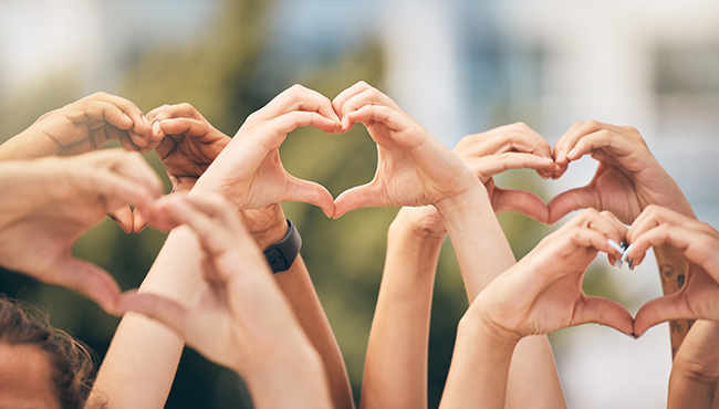 photo of hand hearts