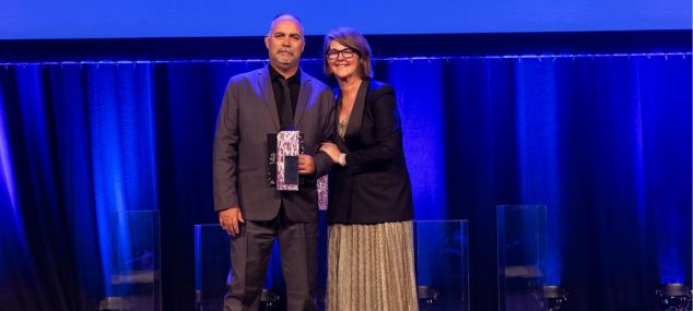 Jason Whitton receives award from Susan Pearce at NSW Health Awards