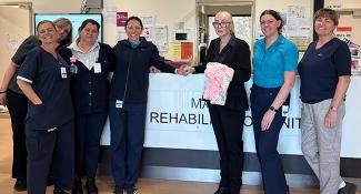 photo of Kylie and the Maclean rehab team.