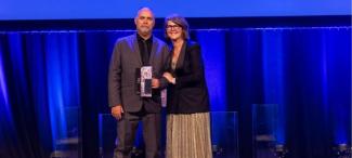 Jason Whitton receives award from Susan Pearce at NSW Health Awards